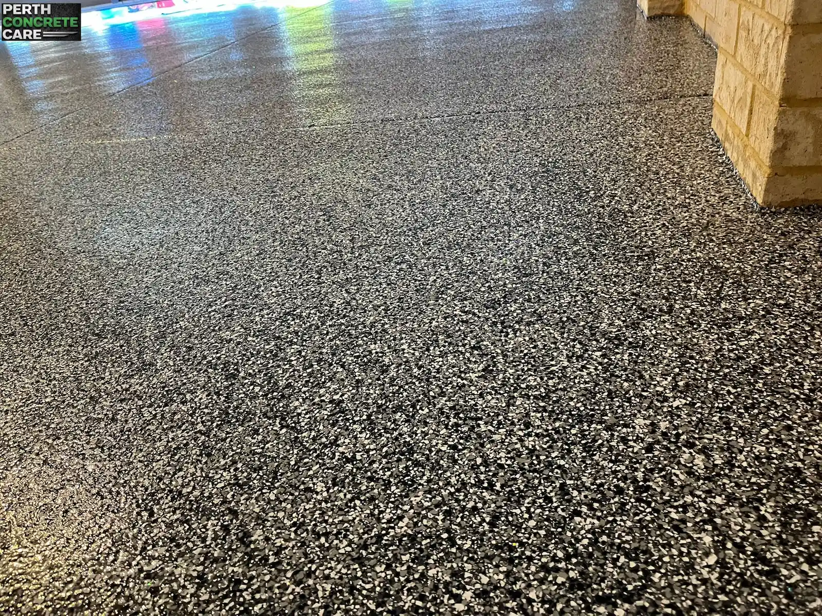 Epoxy flake garage floor with cookies and cream flakes installed in Banksia Grove, W.A