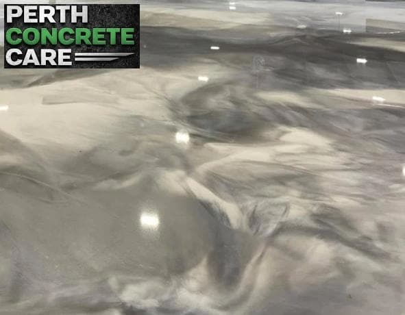 High-gloss metallic epoxy floor in a Wanneroo living space with marbled effect