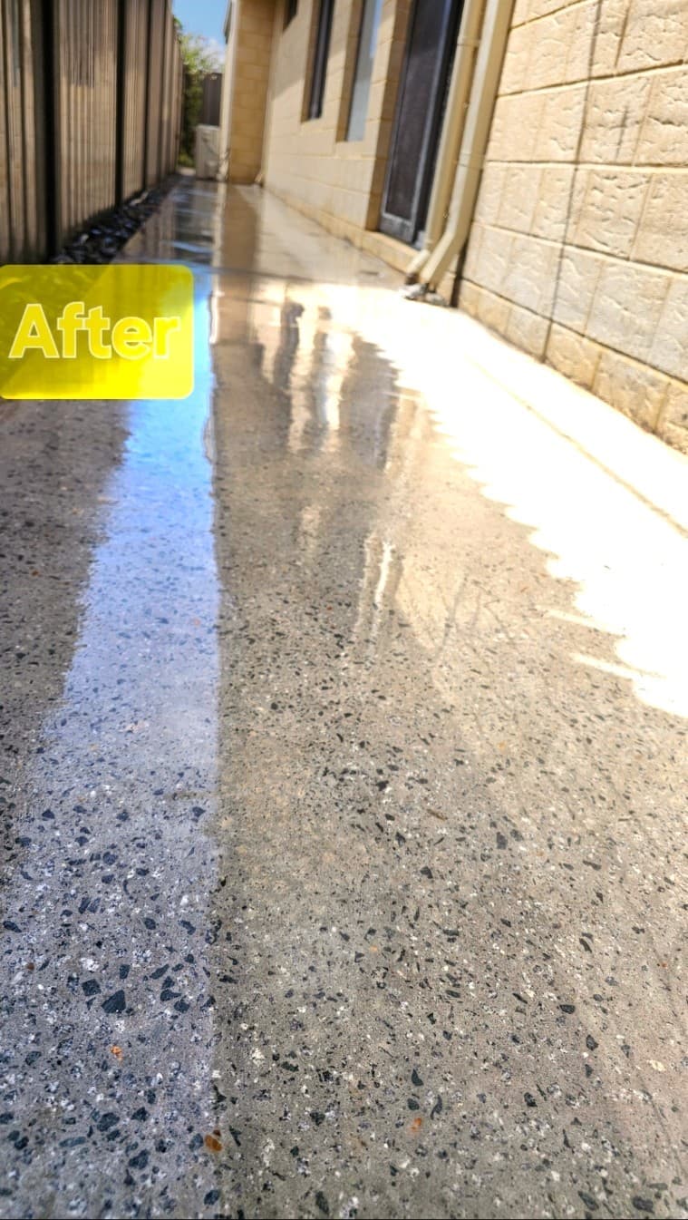 Garage concrete floor after paint removal and hone & seal finish